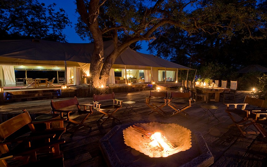 Campfire,-Seating,-Dining,-Tent-Exterior,-Zarafa-Camp,-Botswana.jpg