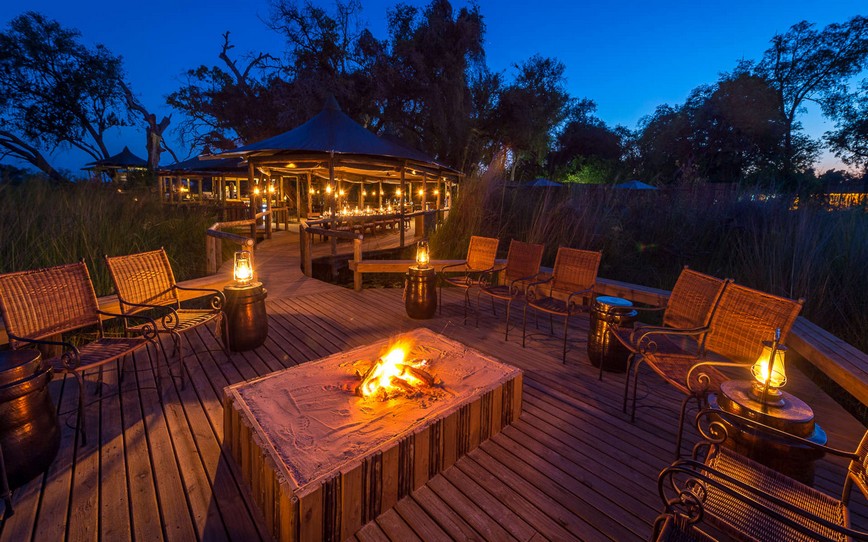 Campfire,-Seating-Area,-Guests,-Little-Vumbura-Camp,-Botswana.jpg